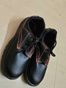 Black Shoe with Orange Stitching