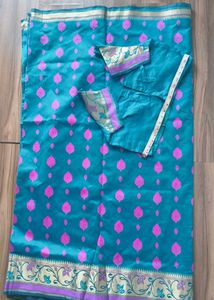 Elegant Teal Silk Saree with Pink Motifs