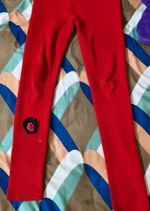 Red Textured Leggings with Floral Applique