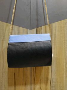 Chic Two-Tone Clutch with Gold Chain