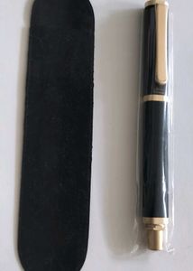 Elegant Black and Gold Pen with Velvet Sleeve