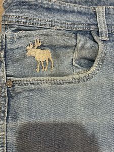 Light Wash Denim Jeans with Embroidered Detail