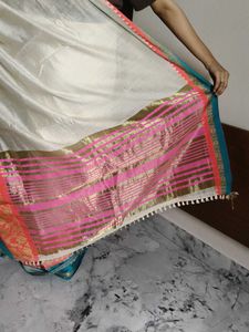 Elegant Cream Saree with Vibrant Border
