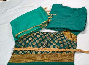 Elegant Teal Anarkali Suit with Gold Embellish