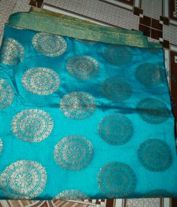 Stunning Teal Saree with Gold Brocade