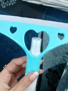 Wiper with spray