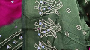 megenta Bandhani Saree with mehndi Border