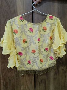 Beautiful Yellow Embroidered Lehenga Choli