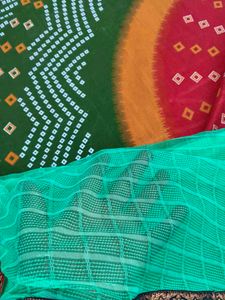 Elegant Green Saree with Intricate Border