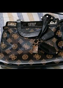 Guess Monogram Sling Bag