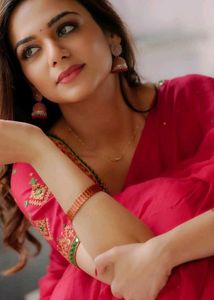 Elegant Pink Saree with Embellished Blouse