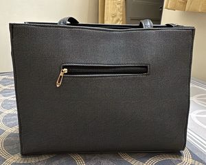 Stylish Grey Bag with Gold Accents