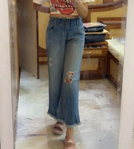 Distressed Flare Jeans