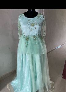 Elegant Mint Green Embroidered Gown