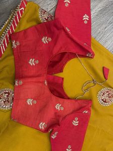 Yellow Saree with Red Embroidered Blouse