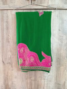 GREEN CHIFFON SAREE WITH PiNK EMBROIDERY