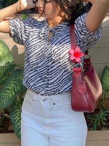 New with tag Stylish Zebra Print Tie-Neck Top