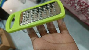 Handheld Grater with Container