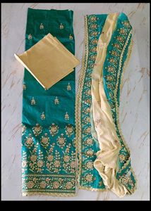 Embroidered unstitched dress material