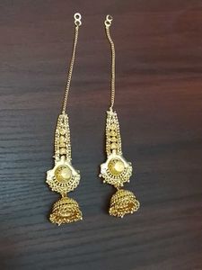Gold Jhumka Earrings with Green Stones