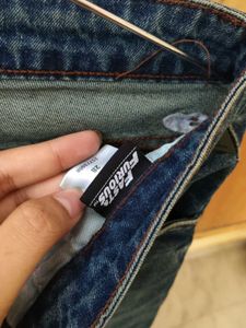 Distressed Flare Jeans