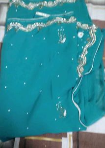 Beautiful Teal Saree with Embellishments combe pac
