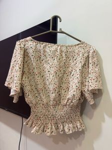 Chic Floral Smocked Peplum Top