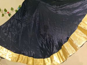 Elegant Black Skirt with Gold Border
