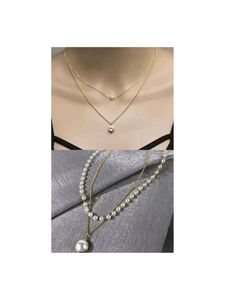 Layered Pearl & Charm Necklace