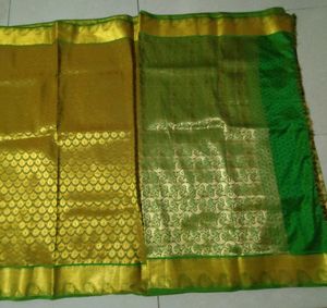 Elegant Green Silk Blouse with Gold Border
