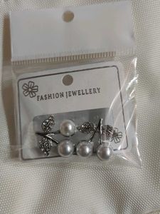 white bow earrings