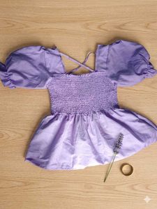 Purple Smocked Peplum Top
