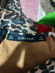232510. Chic Leopard Print Ruched Mini Dress