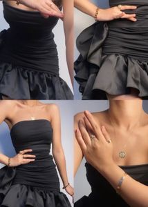 Elegant Black Strapless Ruched Dress