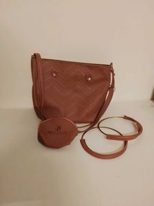 Chic Pink Handbag with Matching Pouch