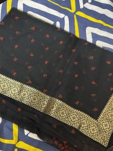 Elegant Black Saree with Floral Motifs