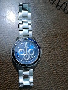 FOSSIL SILVER CHAIN WATCH WITH BLUE DIAL.