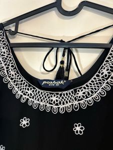 Black &amp; white embroidered kurta with sharara