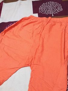 Orange Palazzo Pants length is 44"