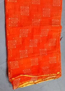 Elegant Orange Saree with White Motifs