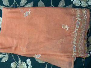 an elegant, cream-toned traditional Indian Kurta