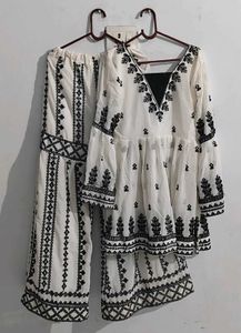 New Embroidered Peplum Set