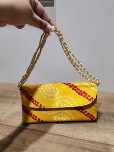 Yellow Bandhani Clutch with Beaded Handle