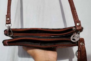 Stylish Brown Clutch with Butterfly Detail