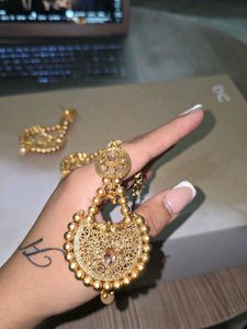 gold pearls mang tikka and earrings