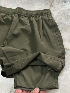 Puma Men's Olive Green Athletic Shorts with Inners