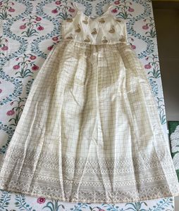 Elegant Cream Ethnic Gown with Swan Embellishments