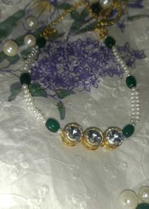 Elegant Pearl and Emerald Chokar set
