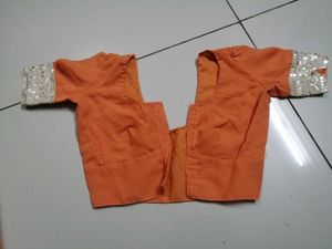 Elegant Orange Saree with Embellished Border