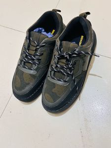 man black &amp; green camouflage low top sneakers